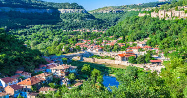 VELIKO TARNOVO, BULGARIA - JULY 06, 2012: Panoramic view on a clear summer day on the hills of Trapezitsa and Tsarevets and the Yantra river in the ancient capital of Bulgaria Veliko Tarnovo.