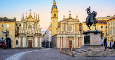 Piazza San Carlo square and twin churches of Santa Cristina and San Carlo Borromeo in the Old Town center of Turin, Italy, on sunrise