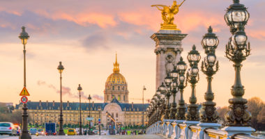 The Alexander III Bridge across Seine river in Paris, France at sunrise