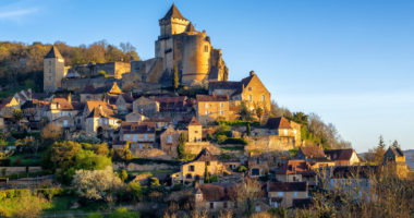 Medieval Castelnaud-la-Chapelle hilltop village with Chateau de Castelnaud castle, Dordogne, Perigord noir, France