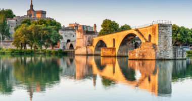 Avignon Bridge with Popes Palace and Rhone River at sunrise, Pont Saint-Benezet, Provence, France.