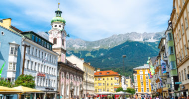 INNSBRUCK, AUSTRIA - AUGUST 29, 2019: Innsbruck town center with lots of people and street cafes in Innsbruck, Tyrol, Austria
