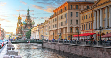 Sunset scene along the Griboedova Canal with Church on Spilled Blood (or Resurrection Church of Our Saviour) in St Petersburg, Russia