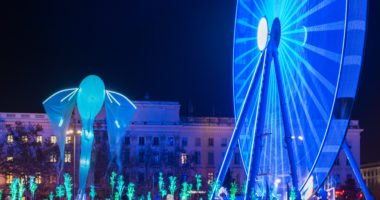 December 04, 2019 Lyon, France : One day day before the Lights event in Lyon, Place Bellecour. Intermittents and preparations for the festival of lights which takes place on 5, 6, 7 and 8 December 2019 in Lyon, France. In the background, the Fourviere hill and the basilica. Internationally renowned, this event is based on the religious festival known as the feast of December 8, feast of the Immaculate Conception, Illuminations or feast of the Virgin Mary. It became a popular event, initiated by the city of Lyon in 1989, which is held every year for four days around December 8, the traditional date of the event, in Lyon (France).Test of the event one day before the light festival in Lyon, France