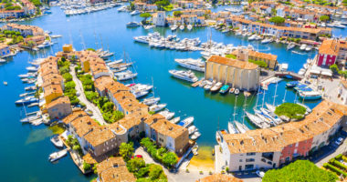 View Of Colorful Houses And Boats In Port Grimaud During Summer Day-Port Grimaud