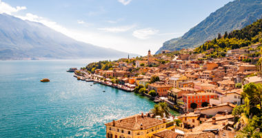 Limone Sul Garda cityscape on the shore of Garda lake surrounded by scenic Northern Italian nature. Amazing Italian cities