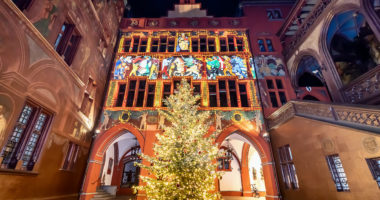 Christmas tree at town hall of Basel, a five hundred years old building dominating the Marktplatz in Basel, Switzerland