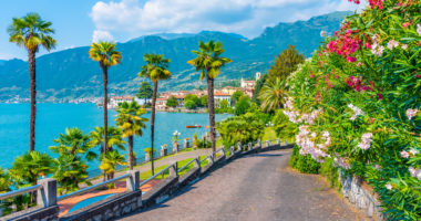 Sulzano viewed behind a garden at lake Iseo, Italy