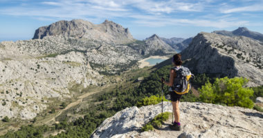 escursionista contemplando el valle de Binimorat y el Puig Major, Paraje natural de la Serra de Tramuntana, Mallorca, balearic islands, Spain