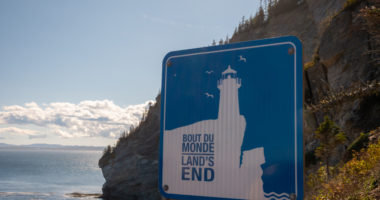 Land's end sign in the Forillon National Park. This sign is at the end of a trail will take you to the eastern tip of the Gaspe Peninsula